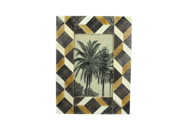 Buffalo Bone Frame. Ecru frame from buffalo bone. Geometric shapes from natural material.