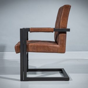 Right-Side view of a metal dining armchair. Powder-coated metal frame in geometrical shape and dark gray matte finish. Seat and backrest upholstered in real brown leather with diamond-shape pattern.