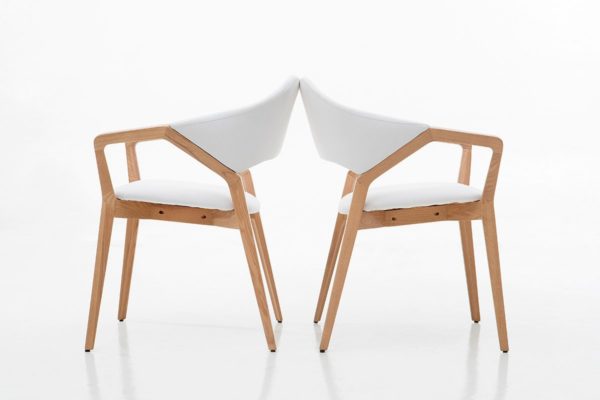 Dining Armchair made of solid beech wood in a matte finish. Upholstered in white fabric.